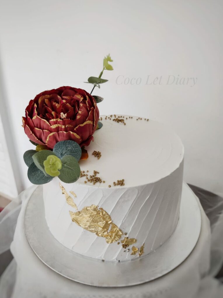 cake decor using artificial peony flowers